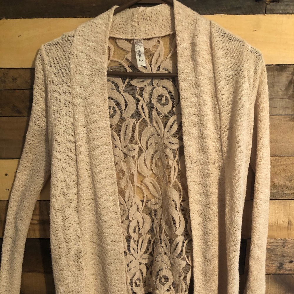Tan cardigan fits a Small